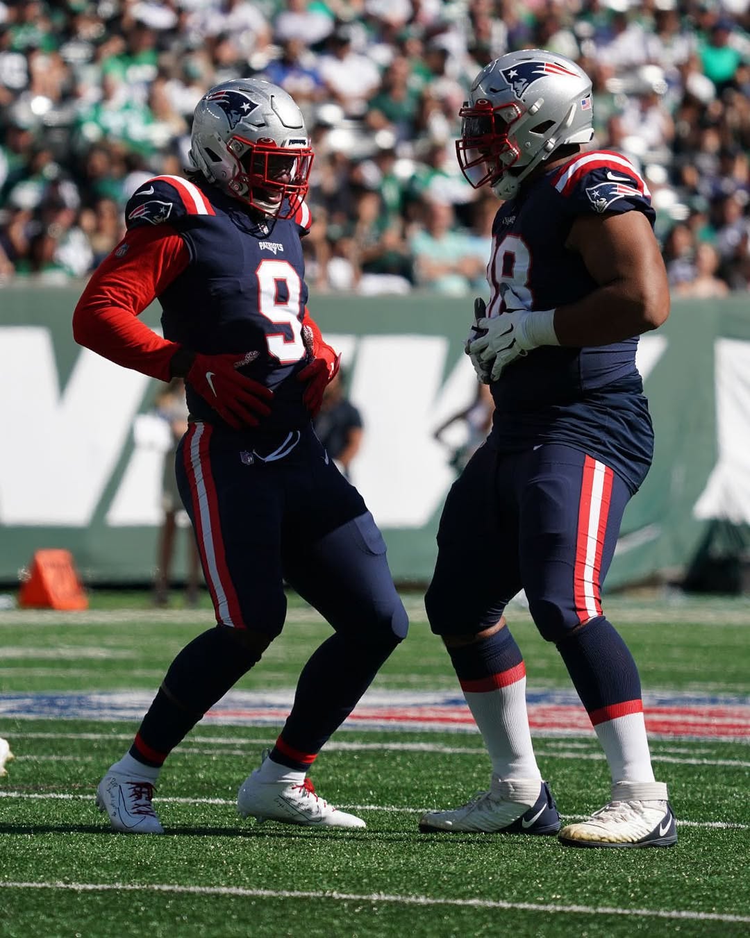 Professional football players on the field during a game