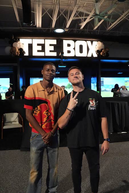 Coinlete team inside the Tee Box golf entertainment venue
